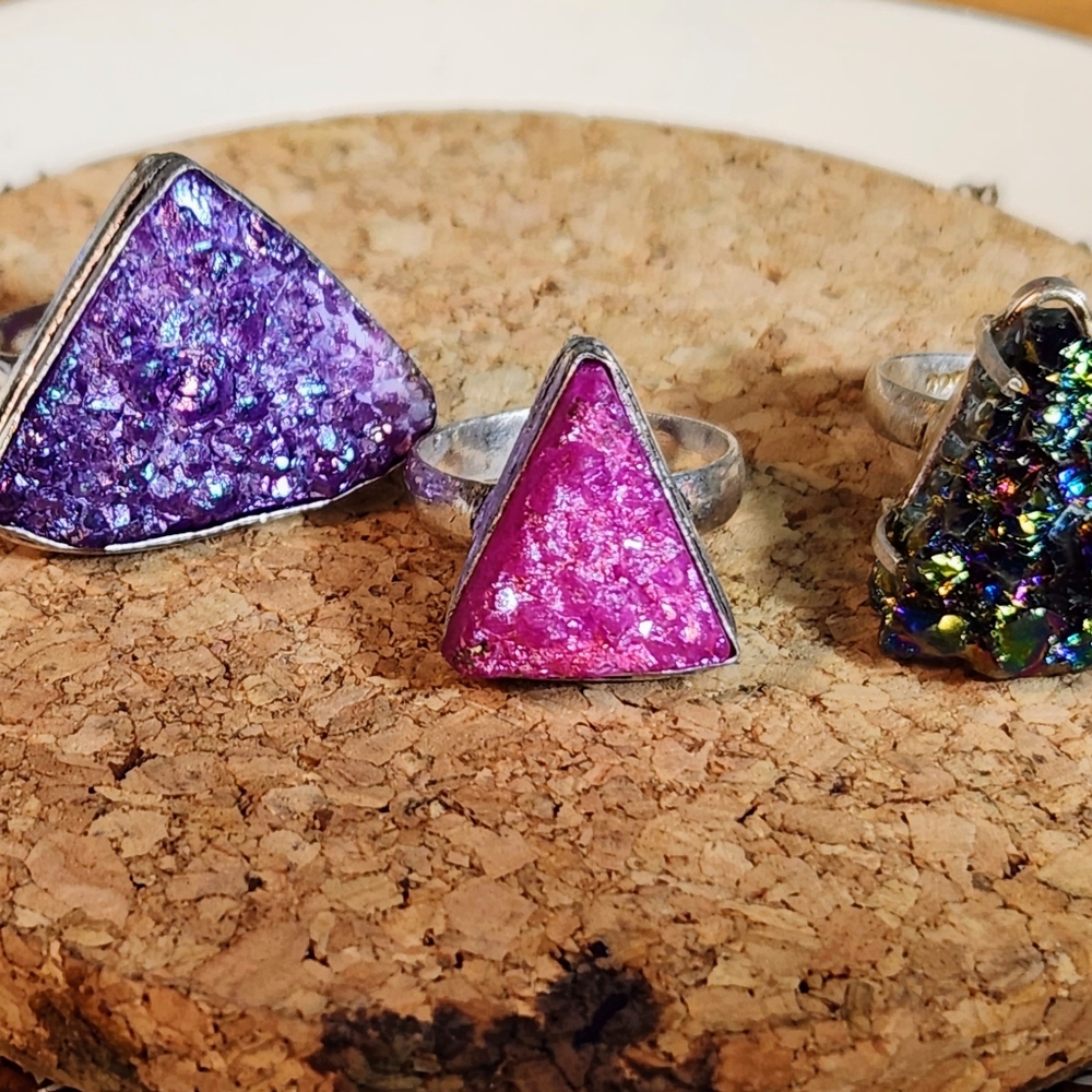 Sparkly druzy rings. 1 bright pink,1 medium purple and 1 rough Rainbow Titanium